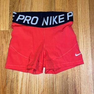 Nike Pro Compression Shorts in “Track Red”